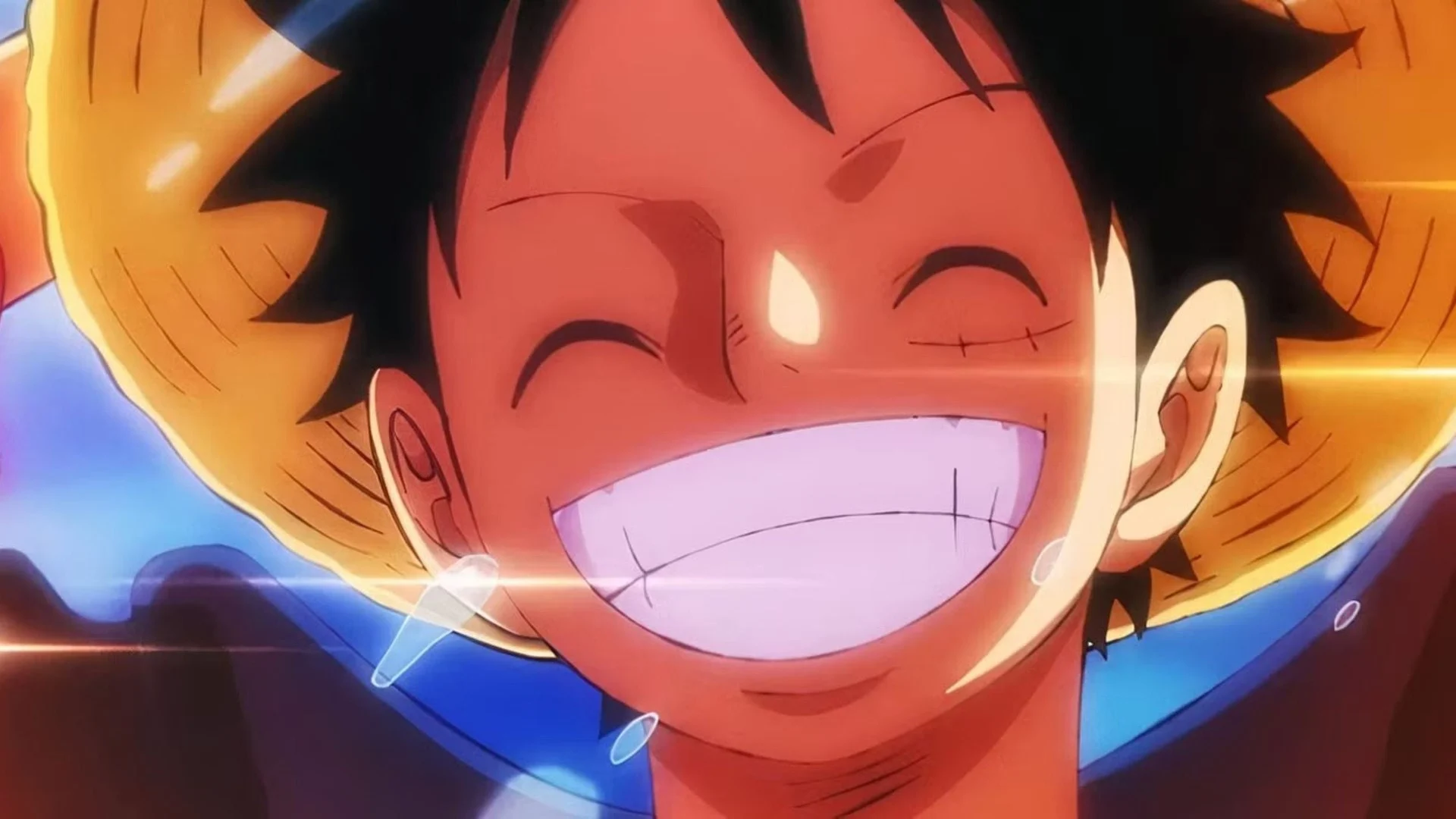 Monkey D. Luffy éclate de rire, son chapeau de paille sur la tête, dans One Piece