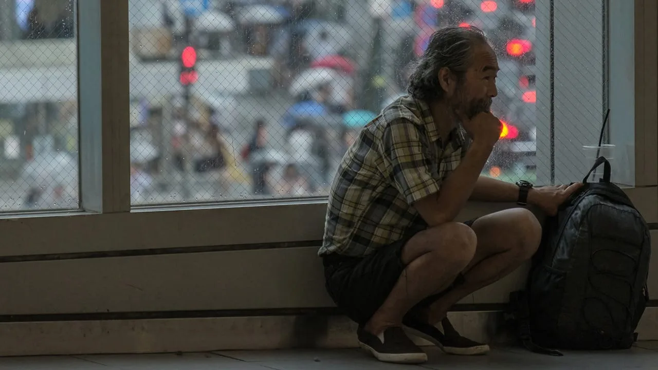 Un Japonais dans une gare