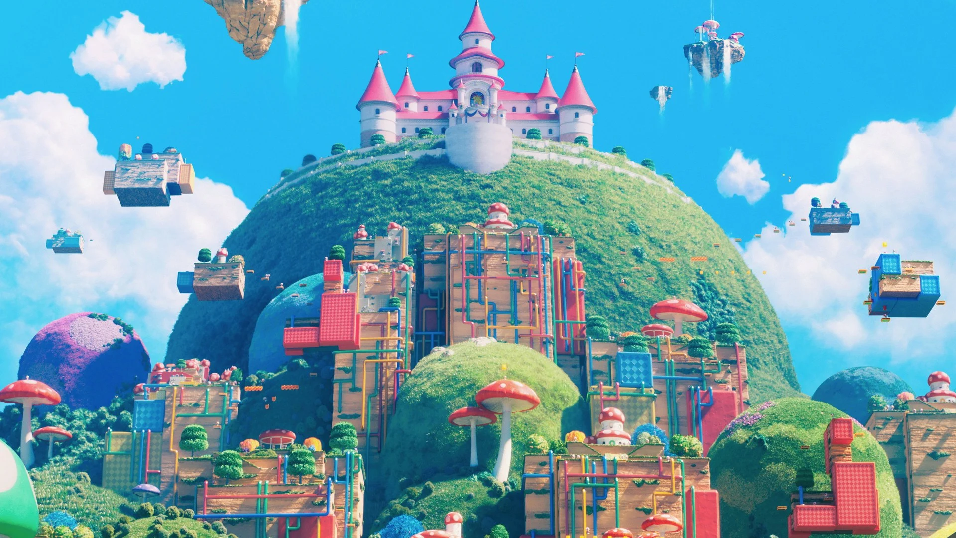 Le château de Peach au sommet d'une colline couverte de maisons colorées et de blocs flottants dans Super Mario Bros. le film