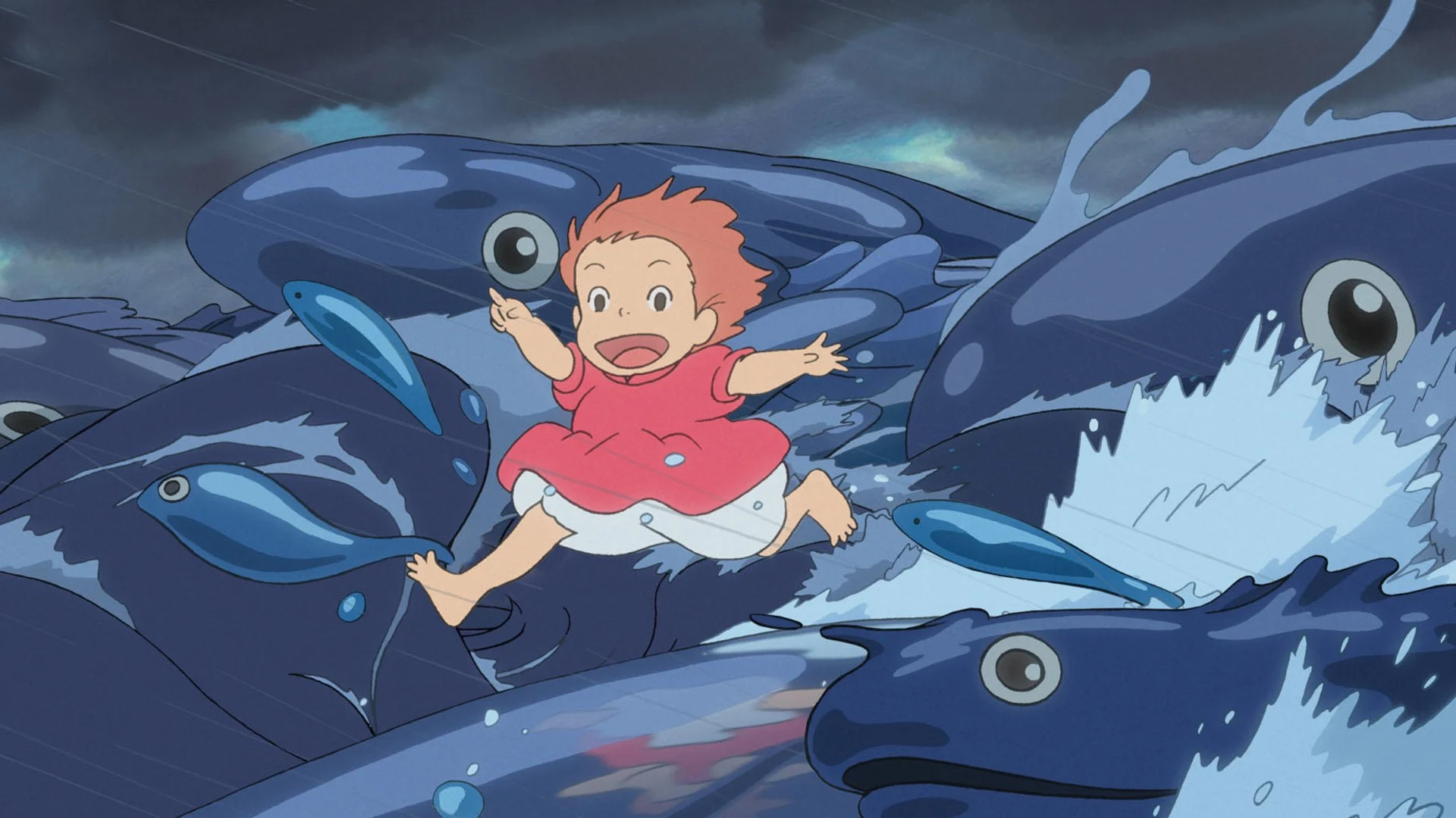 Ponyo, en robe rouge, court sur des vagues en forme de poissons géants, dans Ponyo sur la falaise