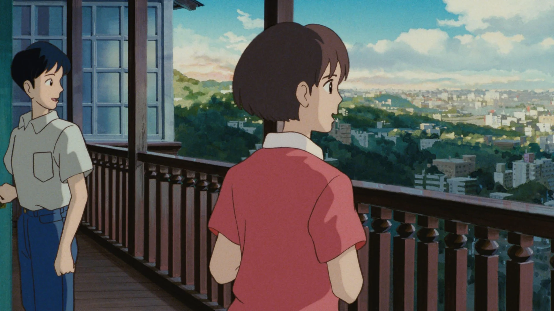 Shizuku et Seiji sur un balcon dominant la ville, dans Si tu tends l’oreille