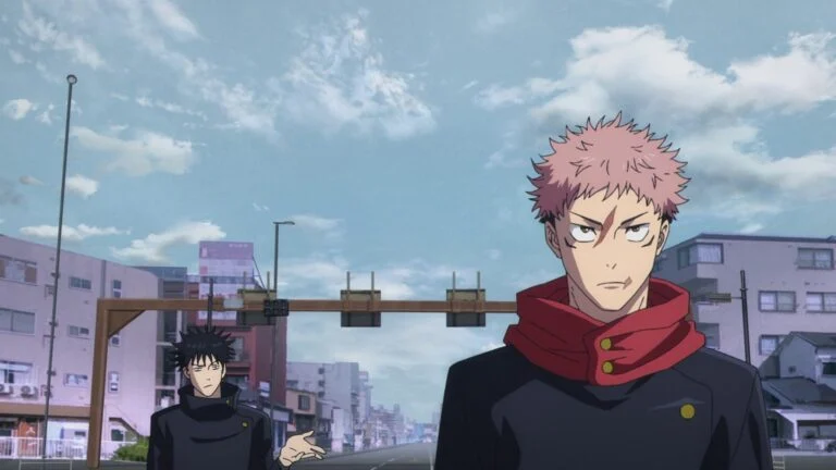 Yuji Itadori, écharpe rouge, et Megumi Fushiguro dans une rue de l’arène 1 de Tokyo, épisode 54 de Jujutsu Kaisen